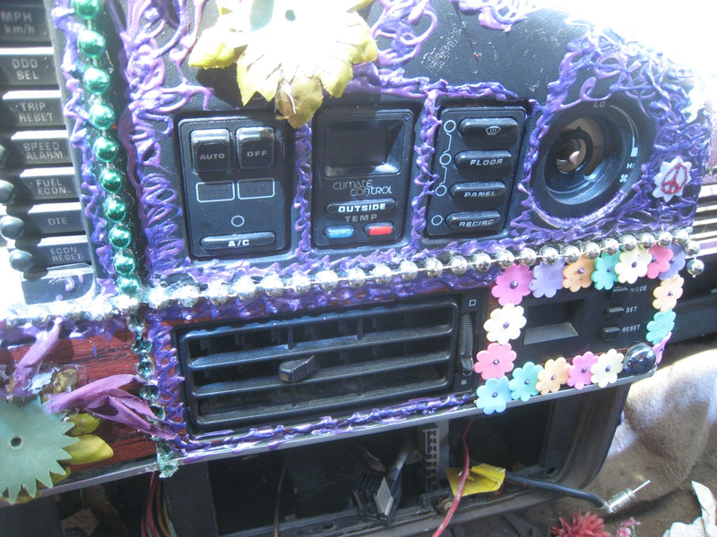 Illustration for article titled Groovalicious Purple Princess Of Peace Art Car Falls On Hard Times, Faces Crusher